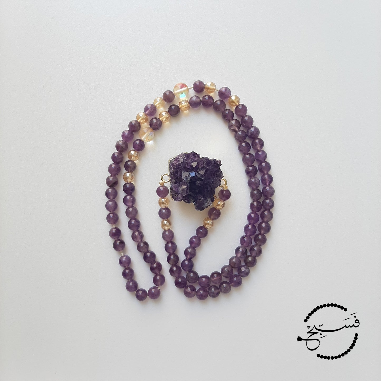 An absolutely stunning amethyst crystal pendant with 24K gold plating, paired with some lovely amethyst beads. Packaged in a luxurious pouch and a gift box. 99 beads