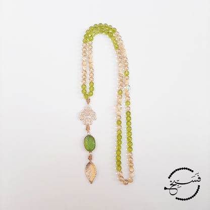 Peridot with gold and trochus shell beads make a truly glamorous tasbih.  Packaged in a luxurious pouch and a gift box.  99 beads