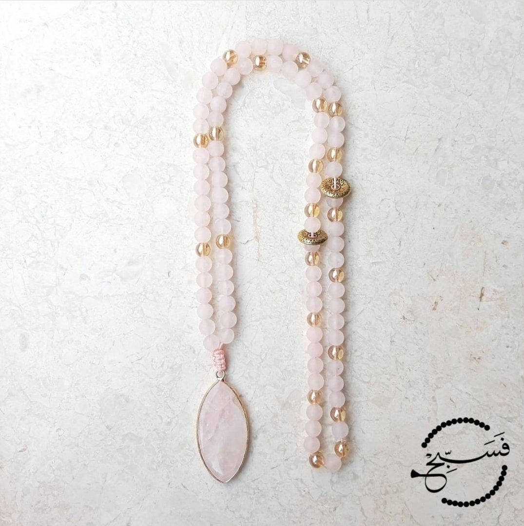 Rose quartz beads and pendant, with just a hint of gold. A classic design, this makes the perfect gift. Packaged in a luxurious pouch and a gift box. 99 beads
