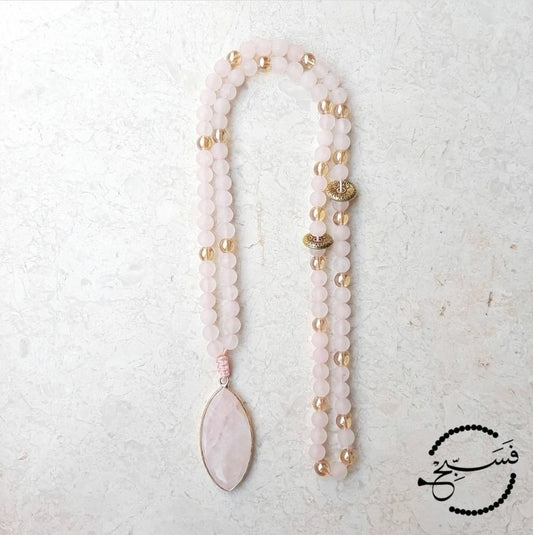 Rose quartz beads and pendant, with just a hint of gold. A classic design, this makes the perfect gift. Packaged in a luxurious pouch and a gift box. 99 beads