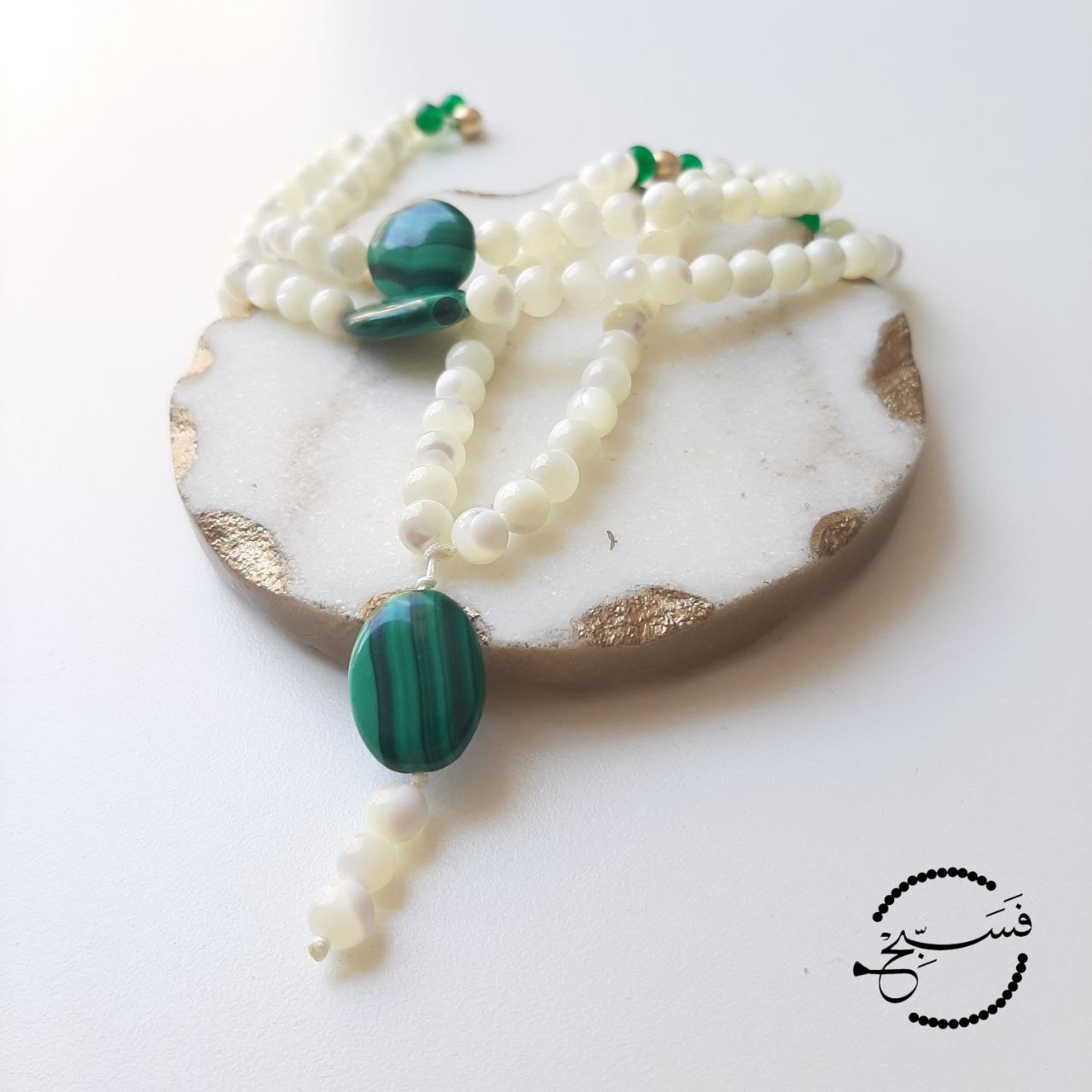 Superb quality natural green malachite has been used to create this piece. It feels super smooth to touch, and is a really lovely piece to use.  Packaged in a luxurious pouch and a gift box.  99 beads