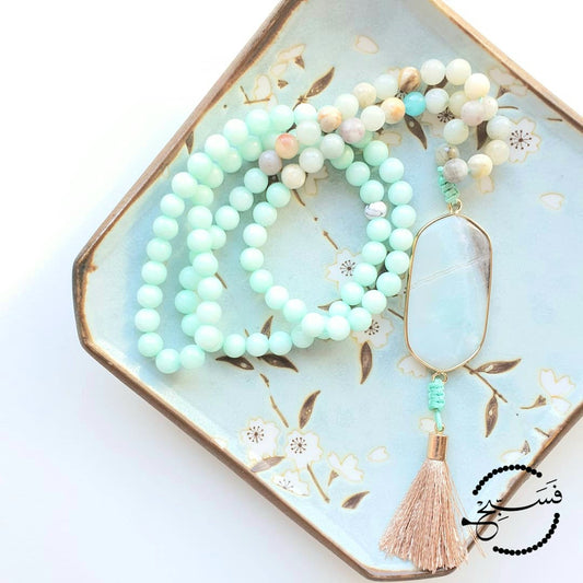 Natural amazonite beads with an amazonite pendant and a silk tassel. Packaged in a luxurious pouch and a gift box.  99 beads