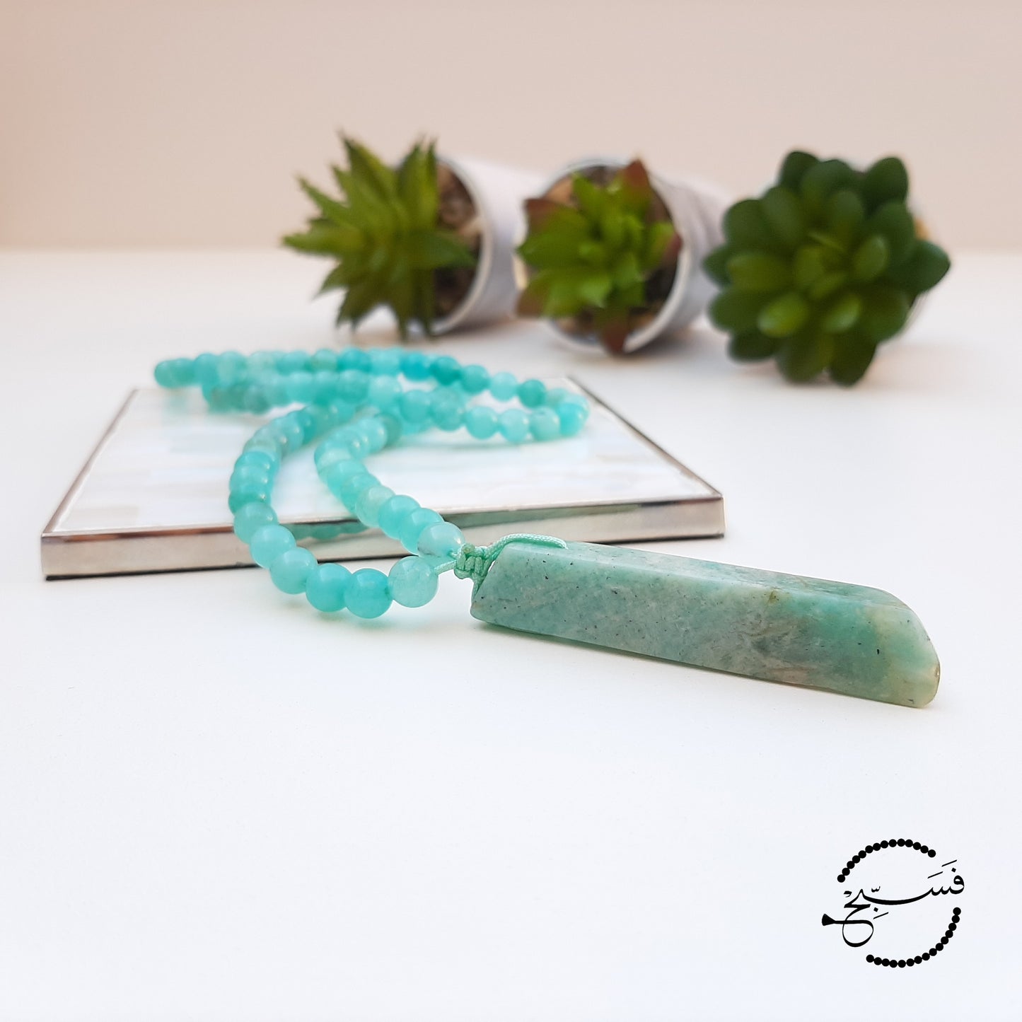 Beautiful blues of amazonite. Natural stone chip with natural amazonite beads.  Packaged in a luxurious pouch and a gift box.  99 beads