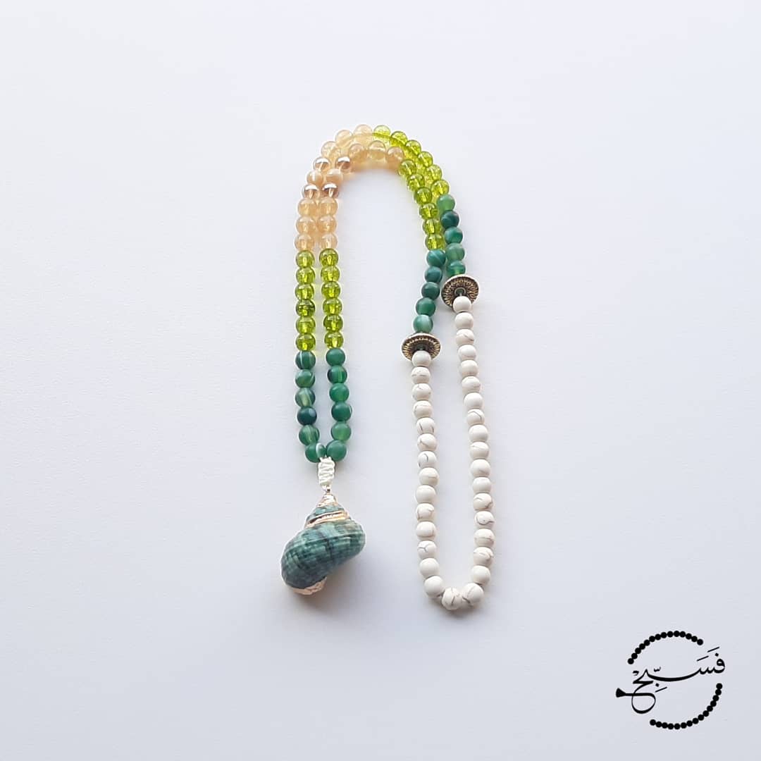 Shell yeah! Fun and cute, this tasbih has proved to be really popular. Green agate with peridot and smoky quartz beads.  Packaged in a luxurious pouch and a gift box.  99 beads