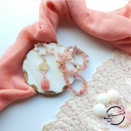 Watermelon and rose quartz beads, delicately combined to create a lovely, feminine piece.  Packaged in a luxurious pouch and a gift box.  99 beads