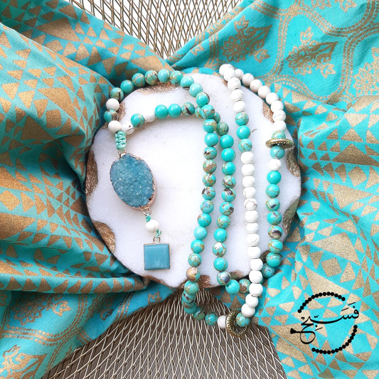 These sea sediment beads are the most gorgeous shade of turquoise! They look especially striking when paired with the beige beads.  We've used a druzy pendant and a mini amazonite pendant to finish off this tasbih.  Packaged in a luxurious pouch and gift box.  99 beads