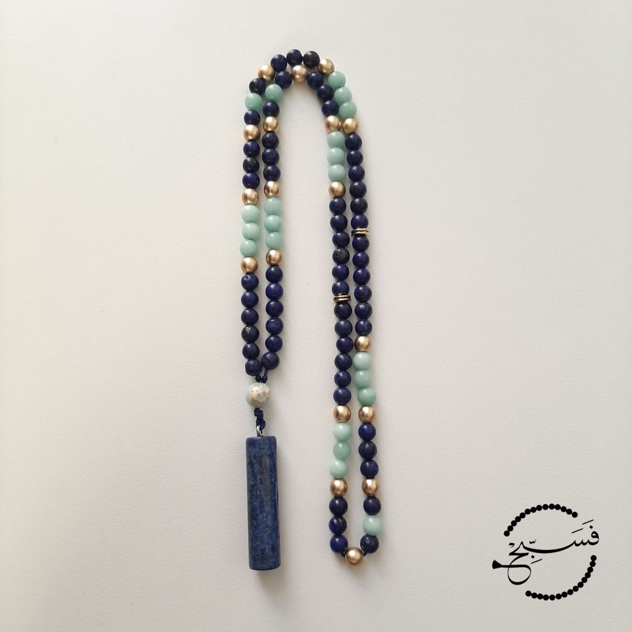 Lapis Lazuli pendant and beads, with amazonite and matte gold beads for a hint of glamour.  Packaged in a luxurious pouch and a gift box.  99 beads