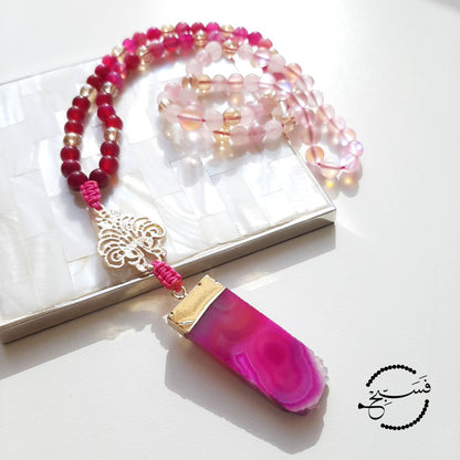 Pink agate pendant, with brass connector for added glamour. The beads are pink agate and rose quartz, with pink moonstone.  Packaged in a luxurious pouch and a gift box.  99 beads