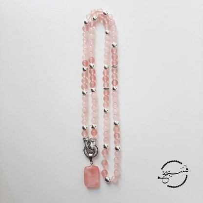 Made of natural rose and watermelon quartz, this feminine design can be used as a tasbih as well as a necklace.